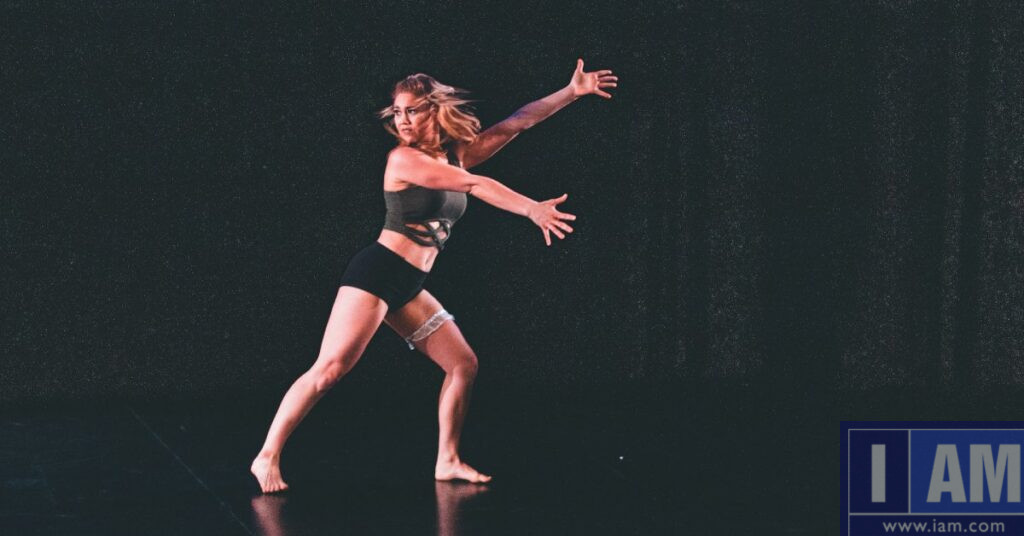 Arms extended dancer