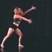 Arms extended dancer